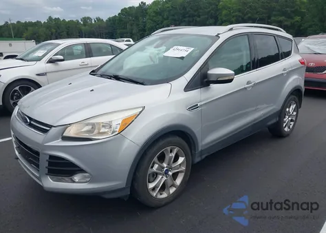 2014 Ford Escape Titanium z USA, uszkodzony, nr VIN 1FMCU9JX3EUD57511